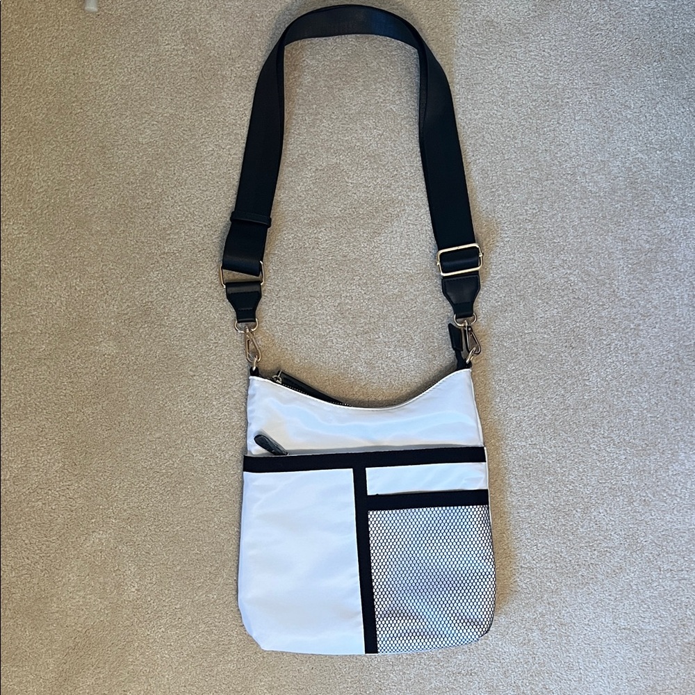 NWOT 14th & Union Black crossbody bag with adjustable strap.